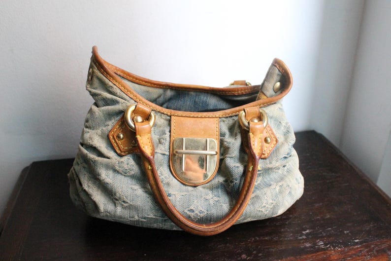 Louis Vuitton Pleaty handbag in blue denim and leather image 11