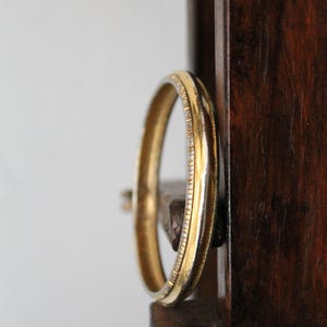 Chanel rigid gold metal bracelet