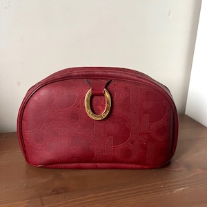 Dior-Clutch aus Canvas und rot/burgunderfarbenem Leder