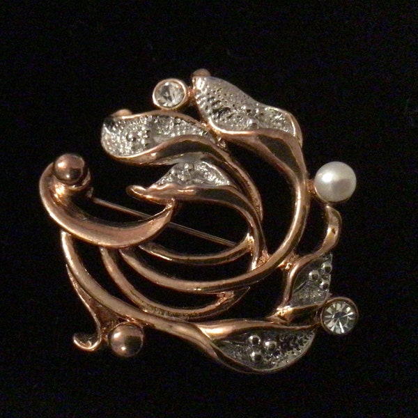 A vintage Movitex brooch