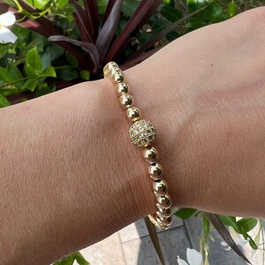 Gold beaded (14GF) 5MM...  w/accent Pandora Ball