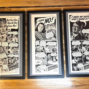 May include: Three framed vintage Colgate toothpaste advertisements. Each features a black and white comic strip with text bubbles and a central image of a person. The text includes "But One Kiss Was All She Gave Me!", "I Said No!", and "I Seen My Duty And I Done It!"