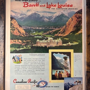May include: Framed vintage travel advertisement for Banff and Lake Louise in the Canadian Rockies. The image features a scenic mountain landscape with a large hotel and additional inset images. Text includes "Mile-High Luxury" and "Canadian Pacific".