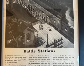 May include: Black and white vintage advertisement titled "Battle Stations" featuring a train at a station with soldiers. The ad includes text about American railroads during wartime, with the American Railroads Association logo.