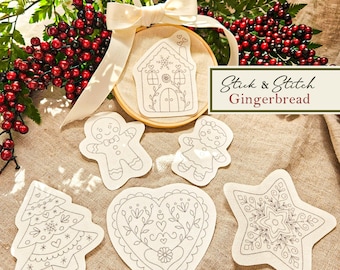 May include: A collection of "Stick & Stitch Gingerbread" embroidery designs. Includes a gingerbread house in a wooden hoop, gingerbread people, a Christmas tree, a heart, and a star, all with detailed outlines for stitching. The designs are on a neutral fabric.
