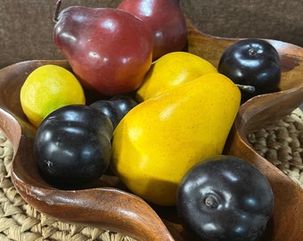 Faux mixed fruit includes: plums, red and yellow pears and a lemon.