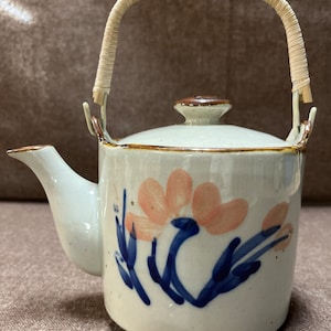 Beautiful vintage floral teapot with fine detailing