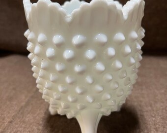 Footed milk glass vase