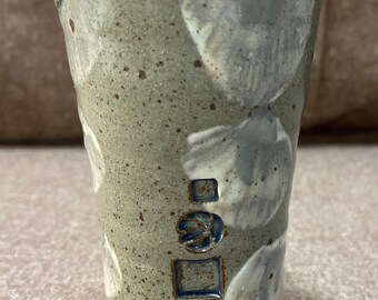 Handcrafted artisan vase in beautiful tans and blues with stamped makers mark