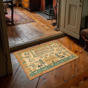 May include: A beige doormat with a vintage-style design featuring a house, trees, birds, and flowers. The text "Welcome" is printed on the mat.