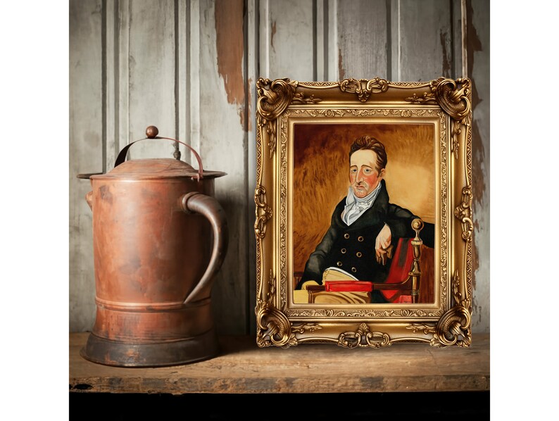 May include: A framed oil painting of a man in a black coat and white cravat, sitting in a red chair with a book in his lap. The painting is set against a gold background and has a gold frame.