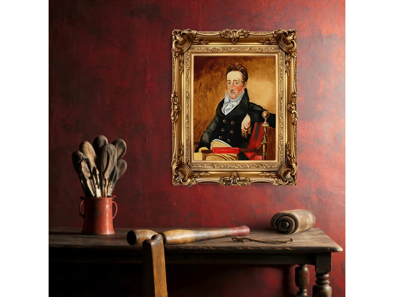 May include: A framed oil painting of a man in a dark suit and white cravat, sitting in a red chair with a book in his lap. The painting is set against a red wall with a wooden table and other objects in the foreground.