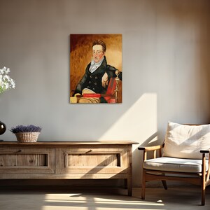 May include: A painting of a man in a dark blue coat with a white collar and a red scarf. He is sitting in a chair with his right hand resting on the armrest. The background is a yellow-brown color.