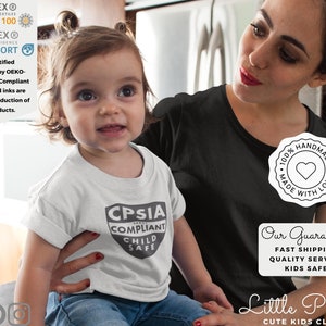 May include: A woman and a child are wearing white and black t-shirts. The child's shirt has a gray logo that says "CPSIA Compliant Child Safe". The woman's shirt has a white logo that says "100% Handmade Made with Love". The text "Our Guarantee: Fast Shipping Quality Service Kids Safe" is visible in the bottom right corner of the image. The text "Little Peekoos Cute Kids Clothes" is visible in the bottom right corner of the image.