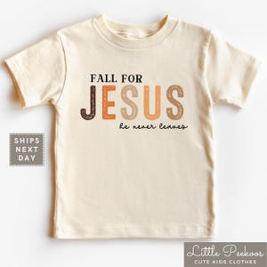 Fall For Jesus He Never Leaves Kids Shirt - Fall Autumn Christian Toddler Shirt - Fall Season Thanksgiving Kids T-Shirt or Tote Bag