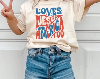 Jesus Fourth Of July Shirt Toddler Shirt - Christian 4th Of July Kids Shirt - Loves Jesus And America Infant Tee - Retro Faith Baby Onesie®