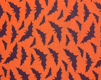 Bats on orange fabric