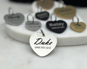 May include: Silver heart-shaped dog tag with the name "Duke" and phone number (949) 555-1212 engraved on it.