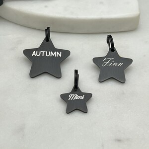 A collection of 3 sizes of stainless steel star shaped pet id tags. 
in black pvd coating with a brushed finish. personalized dog tags,
choose from several fonts.
precisely laser engraved in house by sunset pet tags.
made in the usa with 316 surgical stainless steel.