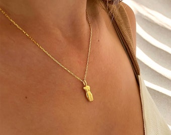 Collier en or pour l'autonomisation des femmes