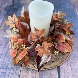 Fall candle ring with faux rust, brown, and beige leaves and accents. Small leaf wreath for fall, fall neutral mini wreath for table decor