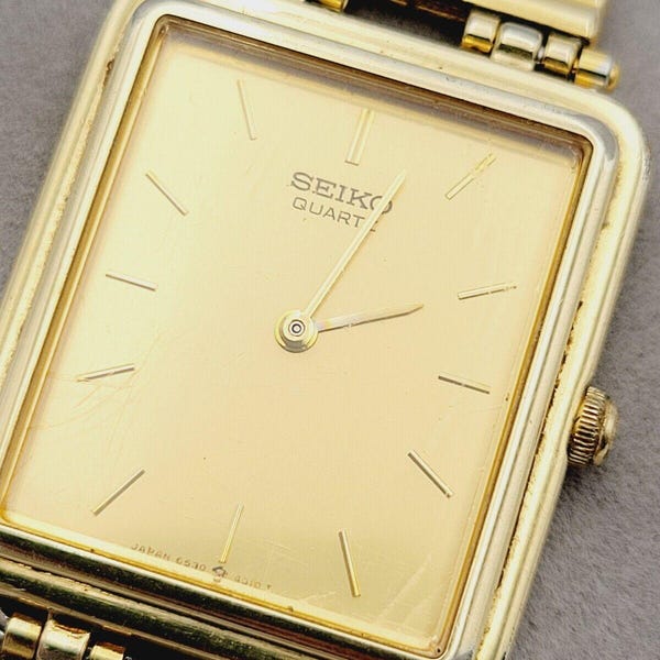 Orologio Seiko Tank VTG da uomo, 27 mm, quadrante dorato, tono oro, rettangolare, 6530-5750, nuovo di zecca