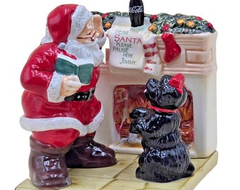 Coca-Cola Jultomten vid eldstaden Hund Salt- och pepparkar Lergods 2002 Vintage