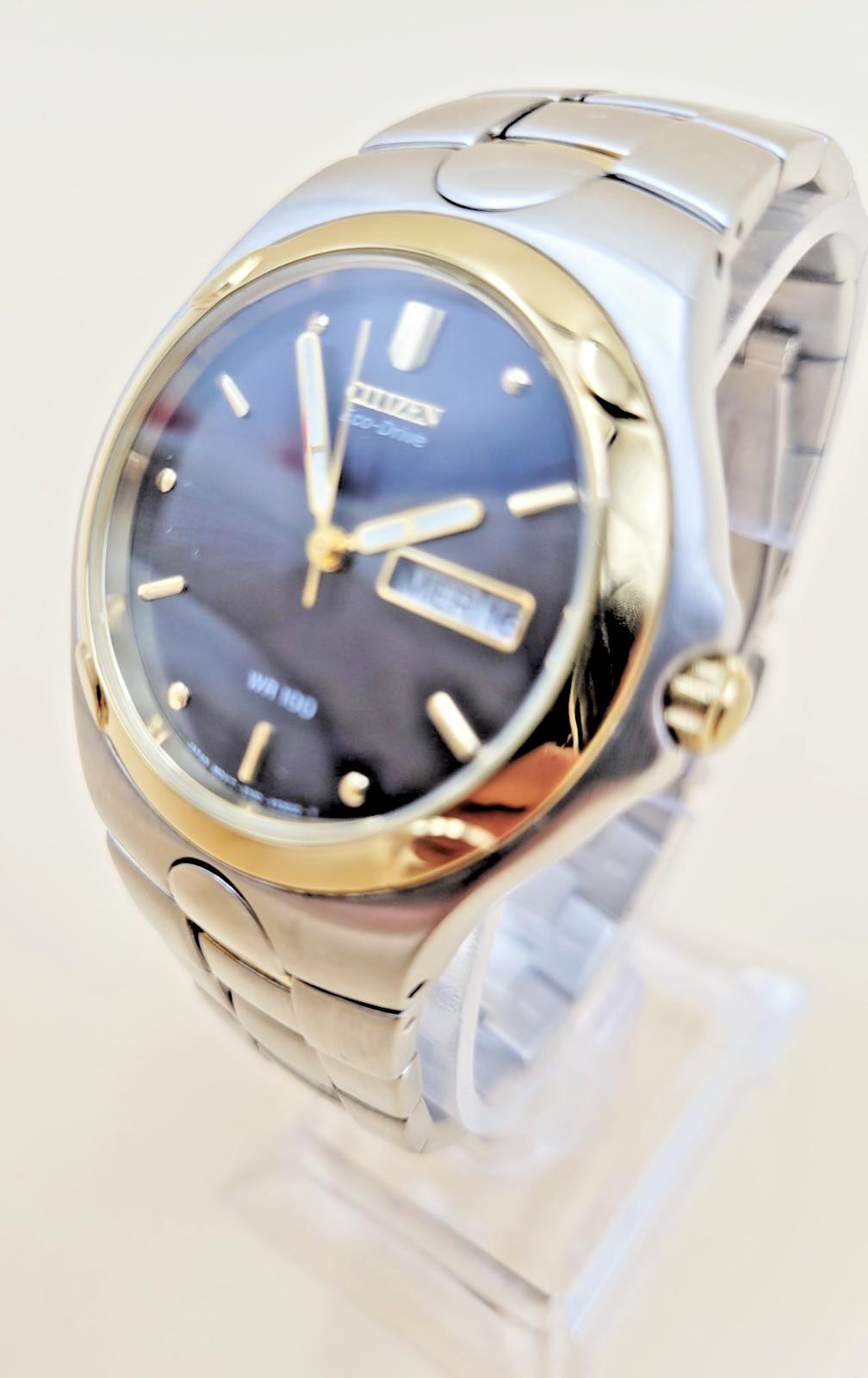 Citizen Eco-drive Black Dial Date Day St. Steel Quartz Watch 