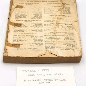 May include: A vintage 1939 illustrated motion picture edition of Gone With The Wind. The book is in delicate condition and the front cover is missing.