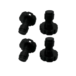 May include: Four black plastic knobs with a threaded post and a star-shaped base.