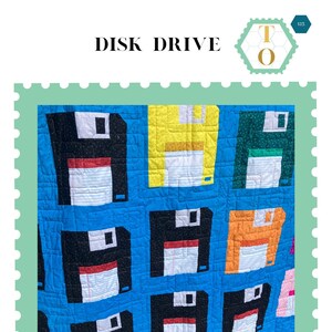 May include: A quilt pattern featuring a blue background with multiple colorful floppy disk designs. The quilt is titled "Disk Drive" and is a pattern from Textile Outpost.