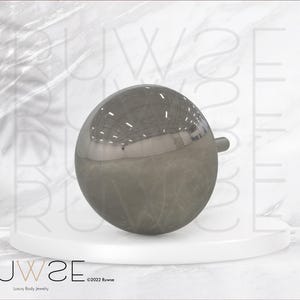 May include: A polished, dark grey metallic sphere body jewelry attachment featuring a smooth, reflective surface. The spherical piece has a small, straight post extending from one side, designed for secure connection to a threaded or push-fit base.