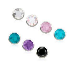 May include: A collection of seven circular stud earrings, each featuring a single faceted gemstone set in a silver-toned metal bezel. The stones appear in various colors including clear, iridescent, light pink, bright turquoise, purple, and black.
