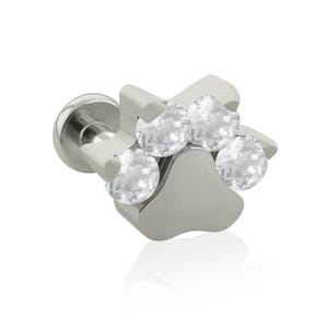 May include: A silver-toned metal body jewelry stud featuring a paw print design. The top of the stud is shaped like a paw with three clear, round, faceted stones set into the upper portion, attached to a flat circular backing post.