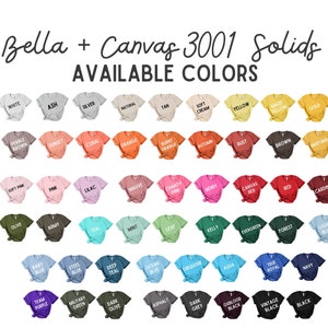Könnte beinhalten: Eine Farbkarte, die die verfügbaren Farben für Bella + Canvas 3001 Solids T-Shirts zeigt. Die Karte zeigt 48 verschiedene Farben, darunter Weiß, Schwarz, Rot, Blau, Grün, Gelb und viele mehr.