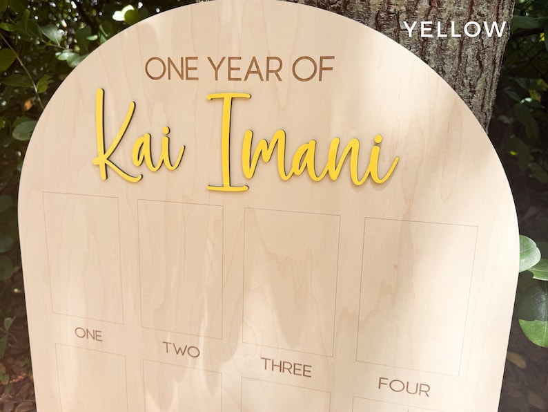 Personalized Birthday picture board with the 3D name in yellow.