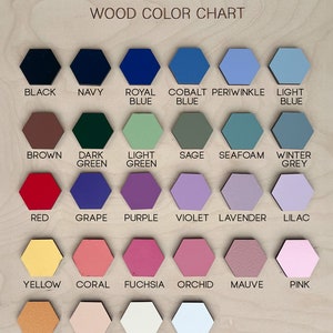 May include: A wood color chart from "the olive branch" featuring a variety of hexagonal color swatches. Colors include black, navy, royal blue, cobalt blue, periwinkle, light blue, brown, dark green, light green, sage, seafoam, winter grey, red, grape, purple, violet, lavender, lilac, yellow, coral, fuchsia, orchid, mauve, pink, mustard, peach, cream, and white.