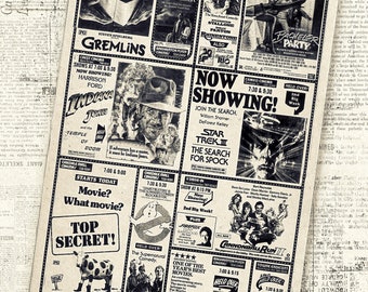 May include: A vintage newspaper page featuring movie advertisements. The ads include titles like "Gremlins," "Indiana Jones," "Ghostbusters," and "Star Trek." The page has a sepia tone, giving it a retro feel.