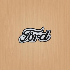 May include: Black and white embroidered patch with the word "Ford" in a stylized script font.