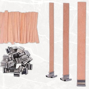 May include: A set of wooden candle wicks with metal wick stickers. The wicks are natural brown and come in various sizes. The metal stickers are silver and are used to secure the wicks to the bottom of candles.
