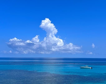 Bewölkter Himmel-blaues Meer