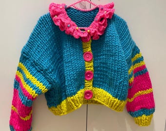 Gebreid roze pastelkleurige clownsvest, clown kernjas, clown vest met kraag, roze circusvest, clown circuskostuum, grote comfortabele bank