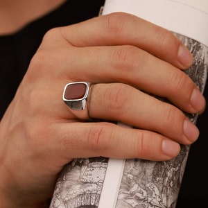 Flat top carnelian ring in sterling silver - still life