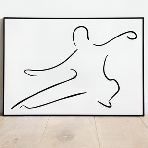 May include: Black and white line art print of a person in a dynamic pose, framed in a black frame.