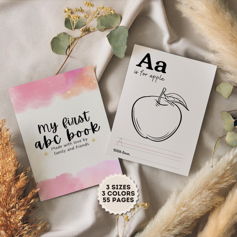 May include: A pink and orange watercolor background with the text "my first abc book" and "Made with love by family and friends". A separate page shows the letter "A" with an apple and the text "Aa is for apple". The text "3 SIZES 3 COLORS 55 PAGES" is at the bottom of the image.
