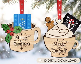 May include: Two wooden mug-shaped gift card holders hanging from red ribbons. The left mug features green holly, red berries, and the text Merry Christmas. The right mug shows a gingerbread man, whipped cream, and the text Merry and Bright.