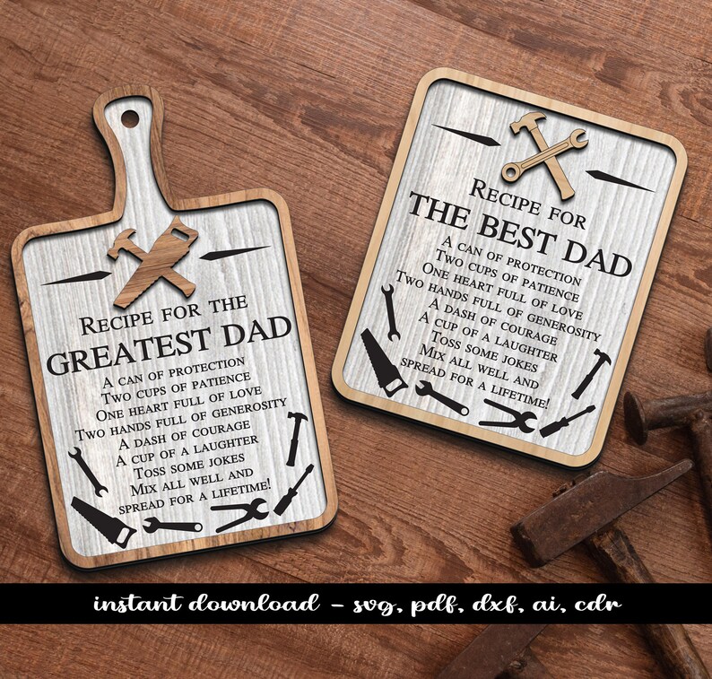 May include: A white wooden sign with a brown border and a recipe for the greatest dad. The sign is decorated with small tools and the text is in black. The sign is on a wooden background.