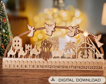 May include: A wooden nativity advent calendar featuring a curved arch with carved angels, palm trees, camels, and a stable scene. The base includes a numbered fence from 1 to 24. The text DIGITAL DOWNLOAD is printed in a white rounded rectangle.