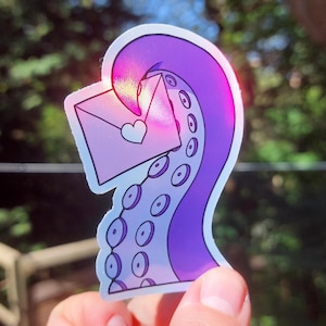 Adesivo de vinil holográfico com carta de amor e tentáculos