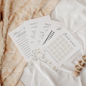 Puede incluir: Un conjunto de juegos de baby shower imprimibles con dise&ntilde;os florales. Los juegos incluyen "What's in your purse", "All you need to know", "What would you rather", "What's your guess" y "Baby Bingo".